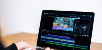 How Video Redaction Aligns with the Growing Push for Ethical Surveillance person using video redaction software on laptop