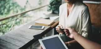 Smart & Inclusive Note-Taking: A Mobile Tech Guide with AI Note-Taker Comparison a man holding tablet in his hand