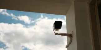 How Modern CCTV Technology Is Changing Home Security in Kent a security camera mounted to the side of a building