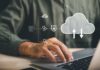 Cloud Security: A Must-Have for Thriving in the Digital Age man on laptop using cloud security
