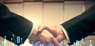 Understanding Smart Contracts on Cardano: A Comprehensive Guide Smart Contracts on Cardano, with two men shaking hands