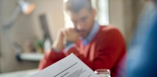 Earning Page Two: A Decision Tree for Executive Résumés team looking through executive resumes