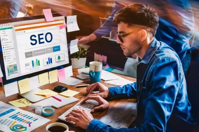 business owner working on improved SEO