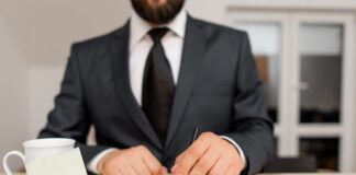 Top Reasons People Are Choosing Online Notaries in 2025 online notaries in an office with a tablet