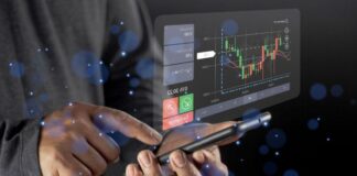 How Does Online Trading Work and What Do You Need to Begin? Man on smartphone online trading crypto currency