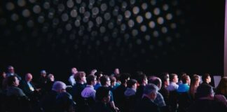 Top SEO Events to Go to In 2025 SEO events with attendees in auditorium