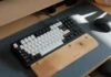 Extend Your Mechanical Keyboard Lifespan with Expert Care a computer keyboard on wooden table