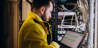 Maximizing Uptime and Efficiency Through Proactive Managed IT Support managed It support with tech worker