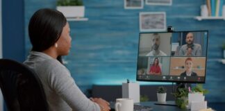 Optimizing Remote Workflows with Integrated Virtual Office Systems virtual office workflow with woman at desk