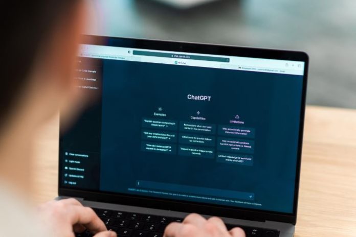 person typing with chatbot about ai visibility