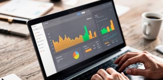 Why You Should Take a PowerBI Course to Master Data Analytics person looking at analytics dashboard