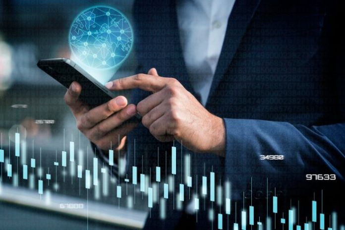 person on phone using fintech loan management