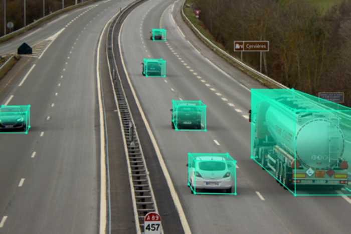 AI ambitions with cars on a road