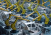 How AI-Powered Laser Platforms Are Transforming Smart Manufacturing in the EV Sector robots working on car frames
