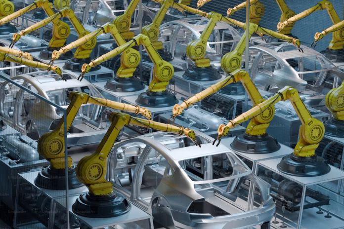 robots working on car frames