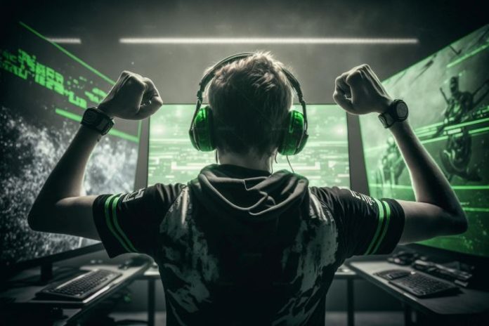 young adult celebrating a win in online gaming