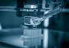 Ways That 3D Printing Helps Us Explore Space 3D printer in action printing a piece of space material