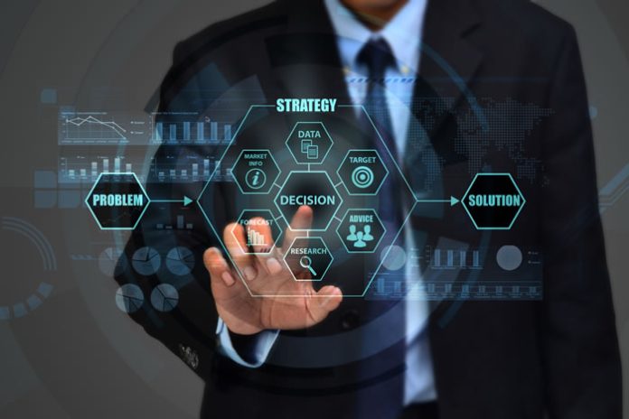 digital-strategy-02-2022-2 man making a choice or decision on a digital virtual dashboard with information insight