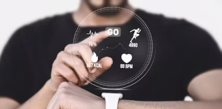 Wearable Technology Can Now Predict Your Migraine Before It Strikes a person using digital watch
