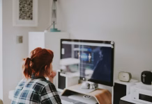 Compact Tech for Hybrid Work and Digital Nomads woman using PC