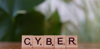 AI-Driven Transformation of Modern Cyber Defense Strategies scrabble block on table
