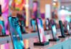 How Cell Phone Shops Prevent Wrong Pickups at the Counter cell phones in smart phone store helping to prevent wrong pickups
