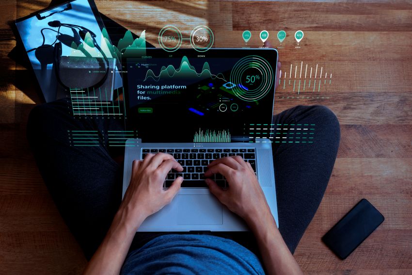 man working on his laptop in a AI-Native CRM