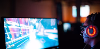 Remote Gaming Without Limits: Download StarDesk in 2026 a man using laptop