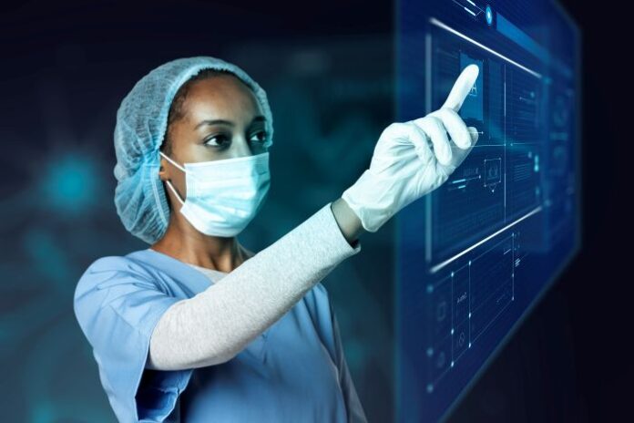 doctor-touching-modern-virtual-screen-interface-medical-technology doctor utilizing medical technology