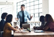 Why Tech Startups Are Turning to Fractional CFOs team listening to their fractional cfos