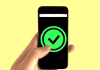 9 Working VPN Discount Codes for 2026: Best Deals and Savings A person holding black smartphone
