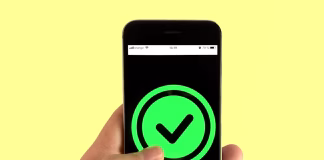 9 Working VPN Discount Codes for 2026: Best Deals and Savings A person holding black smartphone