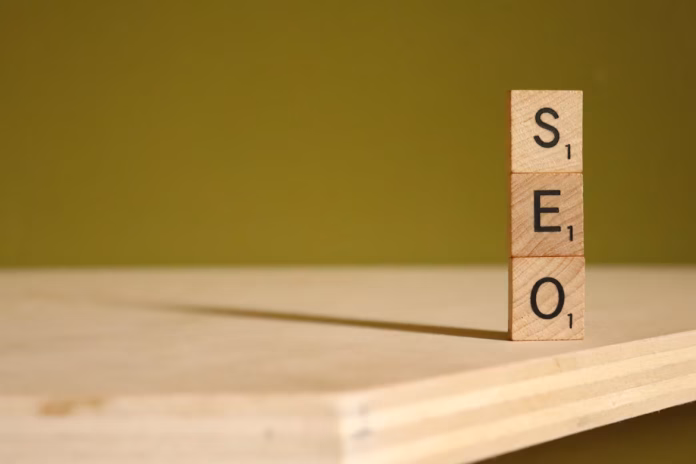 a scrabble wooden block with word SEO
