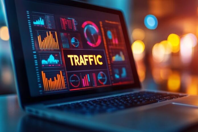 closeup-laptop-screen-showing-website-traffic-analytics (1) laptop displaying site traffic