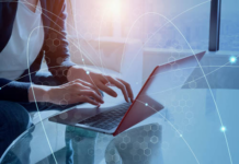 How Technology Is Changing The Way People Work, Learn, And Connect a person working on laptop