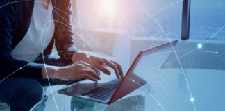 How Technology Is Changing The Way People Work, Learn, And Connect a person working on laptop