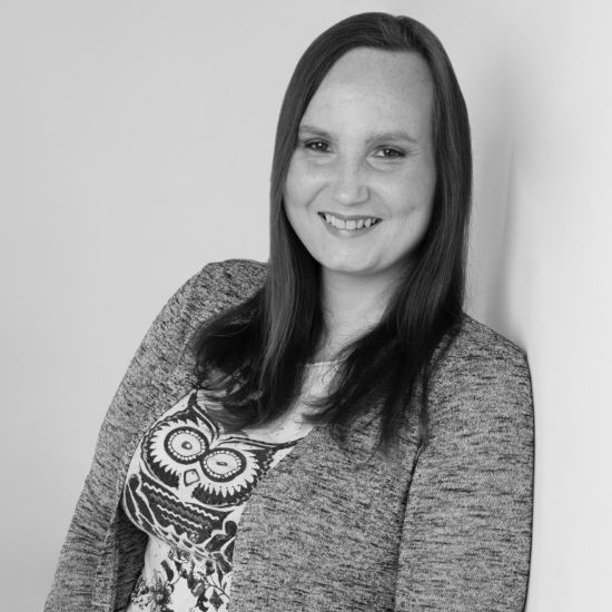 Nell Watson headshot, smiling, black and white version