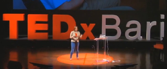 Nell Watson speaking on stage at TEDx Bari