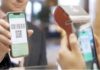 Cross-Border Acquiring: The Technology Behind Faster, Smarter, and More Secure Global Payment Processing a person scanning QR CODE