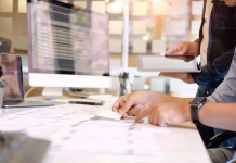 Best Company Data Providers for Real-Time B2B Data person working on table