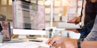 Best Company Data Providers for Real-Time B2B Data person working on table