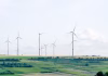 Beyond Waste Containment: How AI, IoT, and Geosynthetics Are Driving Smarter, Cost-Efficient Landfill Expansion windmill surronded by grass during daytime