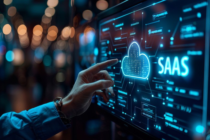person interacting with saas
