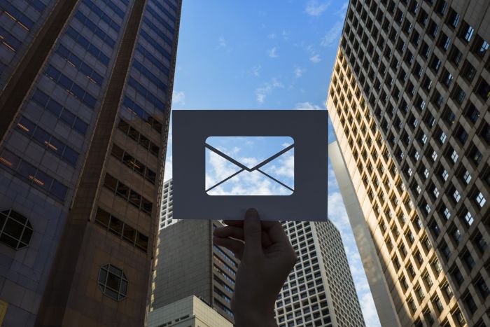 picture of person holding office email in public