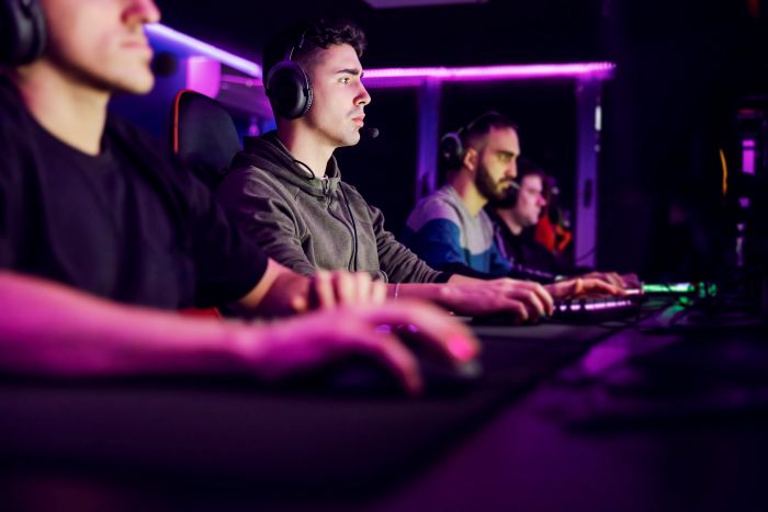 team playing in gaming tournament next to the international