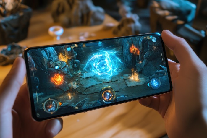 person using phone with igaming
