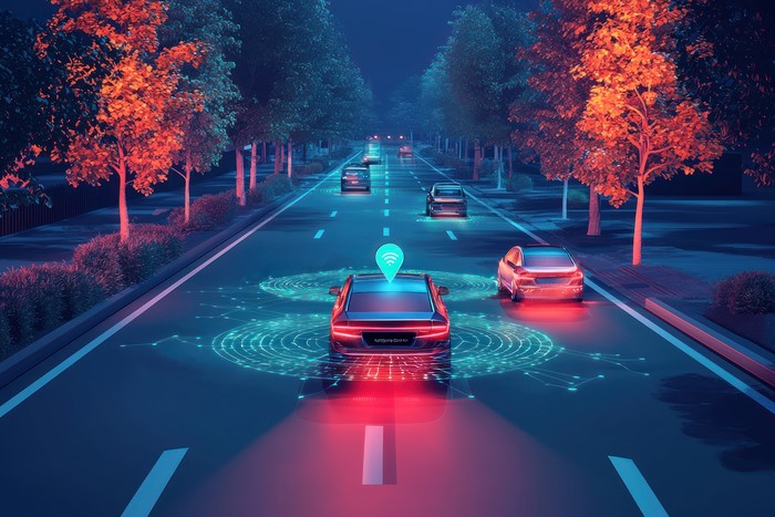 waymo cars driving