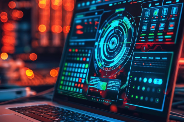 developer using saas on laptop